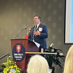 Scott speaking at St. Mary’s University in Minneapolis, Minnesota